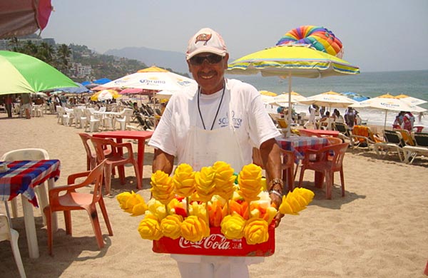 Beach Vendor Selling Artistic Mangos